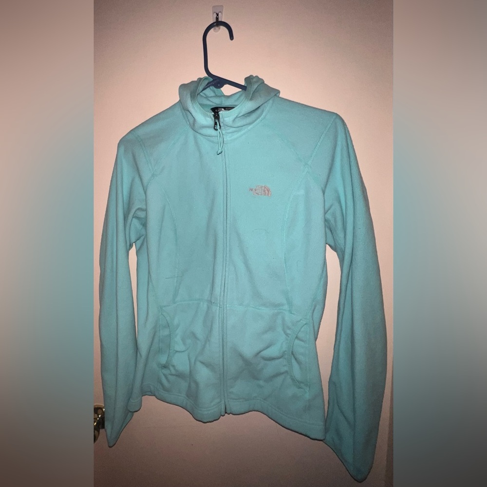 The north face blue zipper jacket